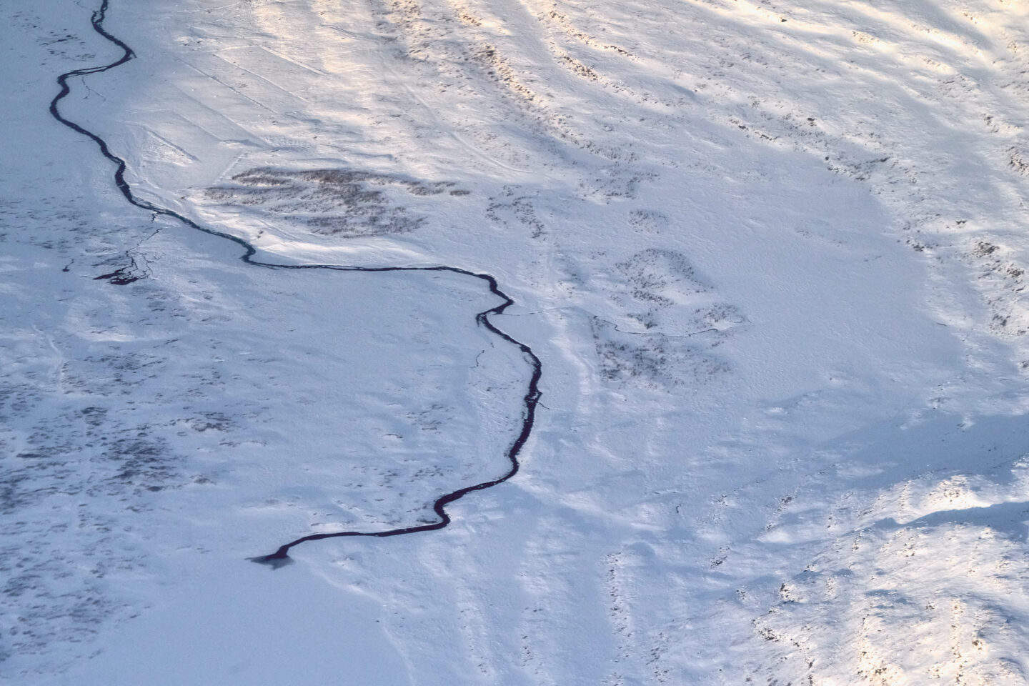 frozen river stream in snow